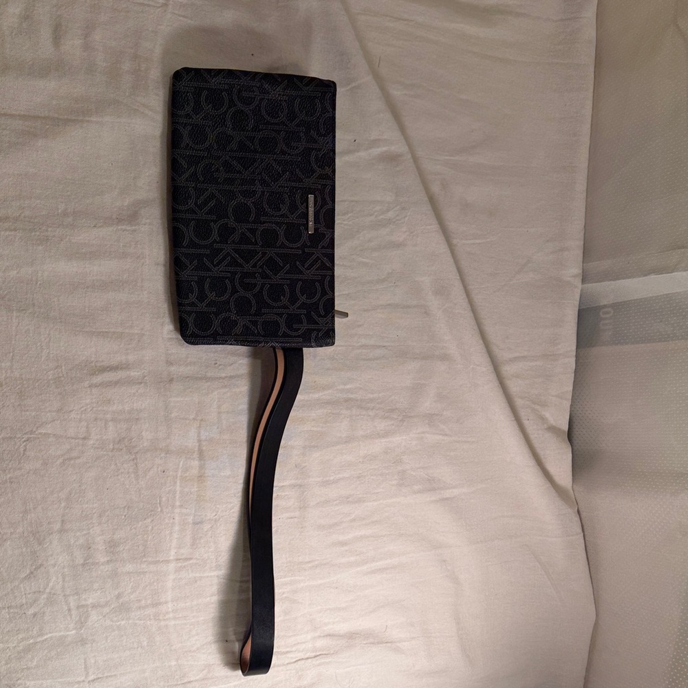 NWOT: Calvin Klein belt wallet with “CK” pattern